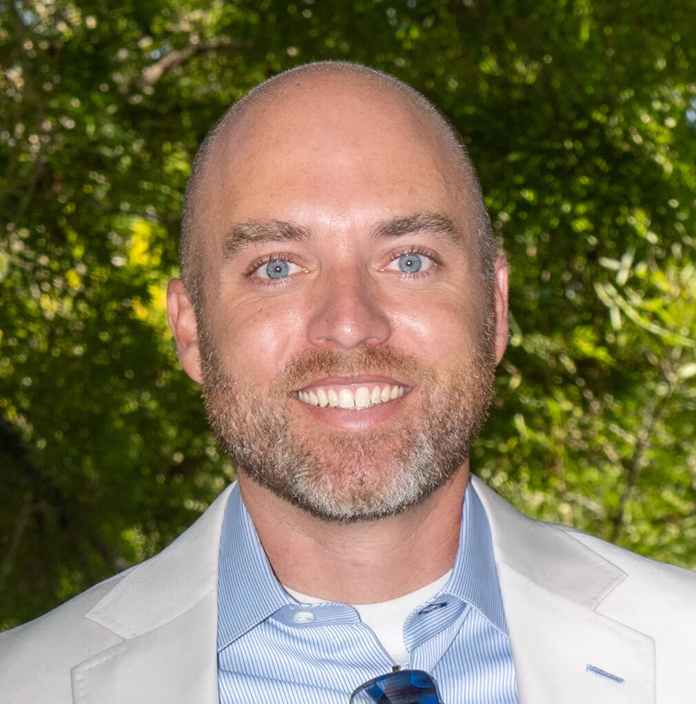 The People Behind This Training Tom Howard is the owner of Leesair, a home services operation he built from $1.6 million in revenue to over $100 million, placing it in the top 0.001% of all contracting companies in the United States. Leesair is now valued past $1 billion. Tom is also Vice President of Customer Experience at ServiceTitan, the dominant software platform used by 85% of home services companies above $5 million in revenue and 99% of companies above $100 million. He is a featured presenter at Pantheon, ServiceTitan's annual conference attended by 5,000 of the biggest companies in the industry. Tom is not a consultant who studied high-performing operations. He built one. Phil Filaski is the number one residential HVAC salesperson in the country. $19.6 million in personal residential sales, closed in the home, in person, knee-to-knee with the homeowner. The number two salesperson in the country did $12 million. Phil beat second place by 80%. He built the entire sales curriculum for Real American Grit: the in-home process, the objection handling, the closing techniques, and the maintenance agreement plays. Every chapter in the Sales category came from Phil closing deals in real homes against real objections. Together, Tom and Phil brought the same operational discipline and field-tested sales methodology that built a billion-dollar company directly into this training. Every course, every scenario, every SOP reflects what actually works when your tech is standing in a living room or your CSR is handling a new lead. Not what looks good in a slide deck. What produces results in the field. "I built a company past a billion dollars. I know what separates the operations that scale from the ones that stay stuck. The ones that scale train their people on a documented process. That is what we built here." Tom Howard, Owner, Leesair Tom Howard: Owner, Leesair ($1B+ valuation). VP of Customer Experience, ServiceTitan. Featured presenter, Pantheon Conference. Author. Built from $1.6M to $100M+ in revenue, top 0.001% of all contracting companies in the U.S. Phil Filaski: Number one residential HVAC salesperson in the country. $19.6M in personal annual sales. Beats number two nationally by 80%. Sales curriculum architect, Real American Grit.